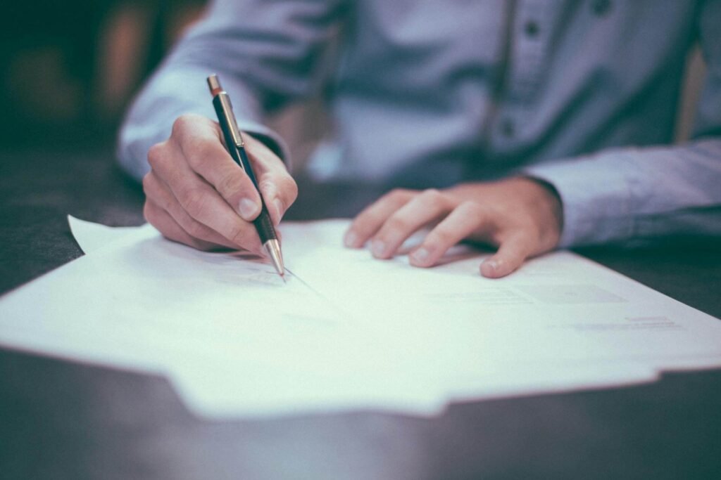 A man reviewing a two weeks notice letter