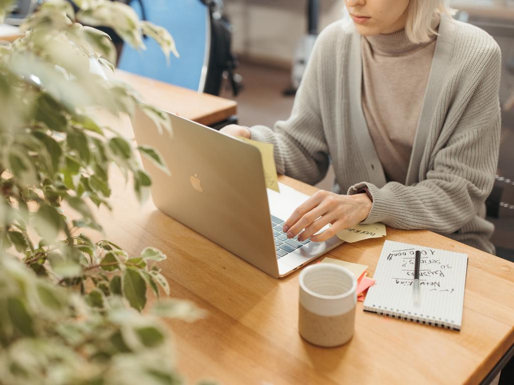 how to address two people in an email A woman is typing in her computer