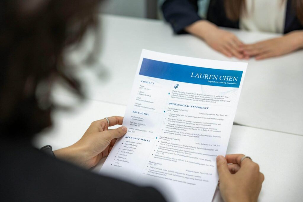 A woman reading a resume