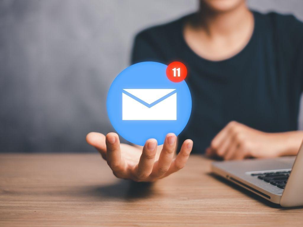 a man highlighting an email icon using AI