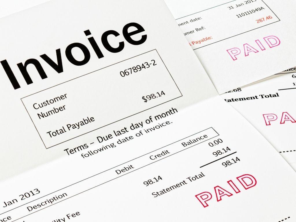 An invoice displaying the charges for writing services. Get paid to write.