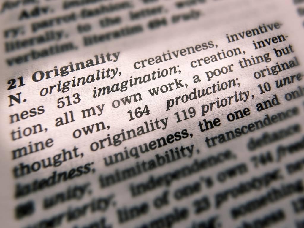 originality highlighted on a dictionary