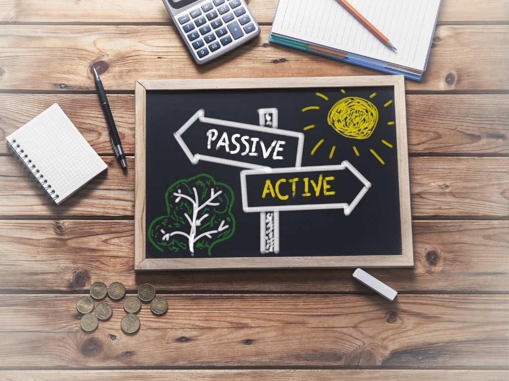 "passive active" written on a board with opposite directions