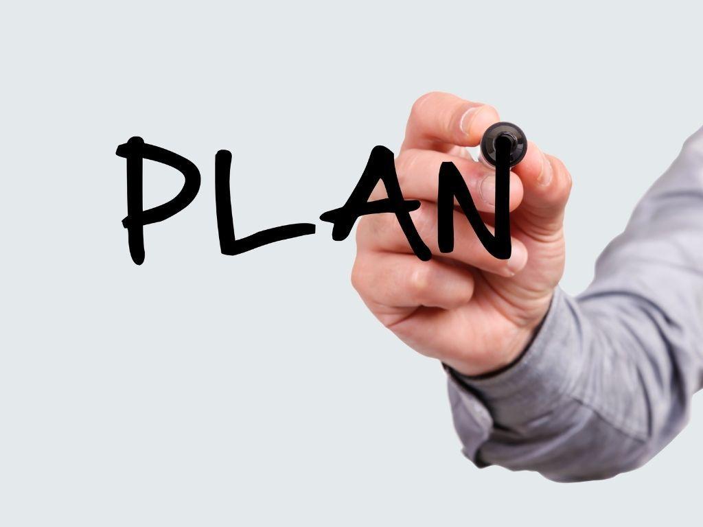 The word "PLAN" 