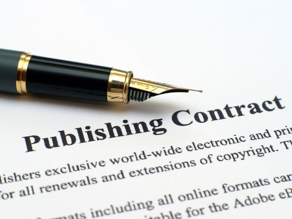 A pen placed near a publishing contract