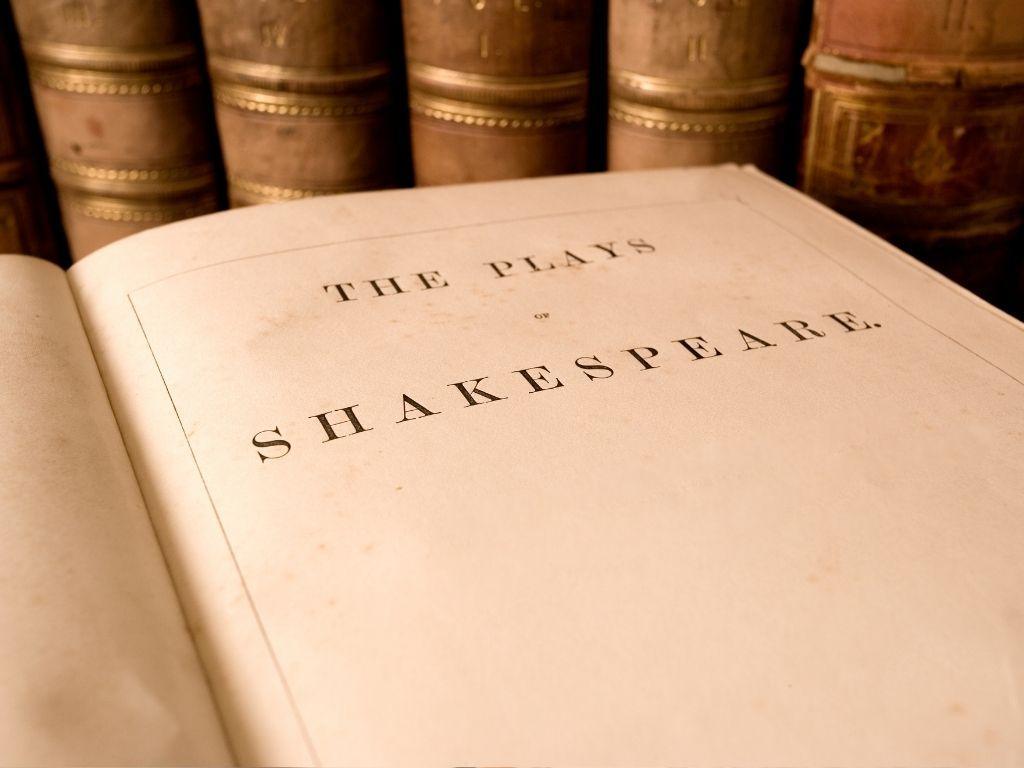 a book with the title: "The Plays of Shakespeare."