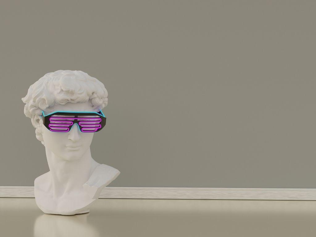 a statue head with funky glasses on