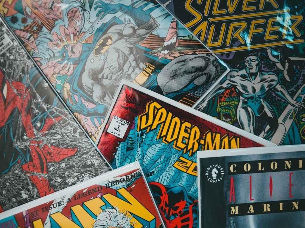 different comic books placed on a table