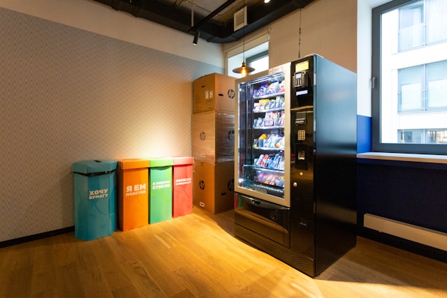 A bulk vending machine against a wall