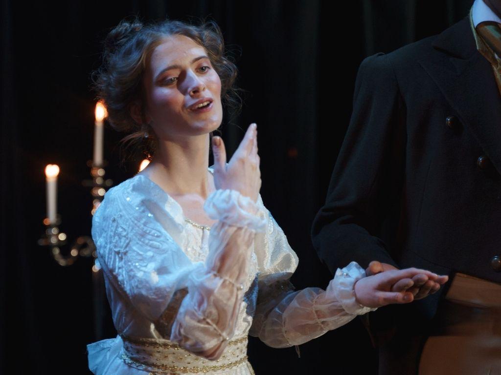 a girl acting in a play