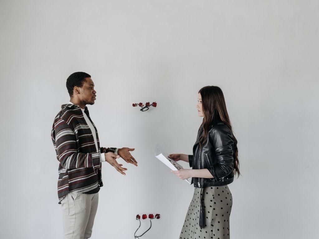 two people practicing a script 