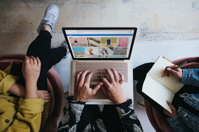 A marketing team working on their computers