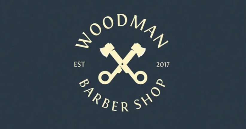 woodman barber shop logo